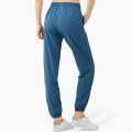 Pantalon de jogger à la taille élastique Femmes Femmes Sweat Pantalons secs Femmes Jogger de vêtements de vêtements Active With Zip Pocket